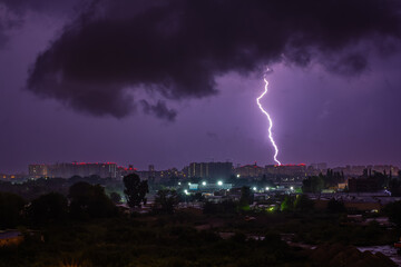 Dramatic Night Thunderstorm: Lightning Flash Over City