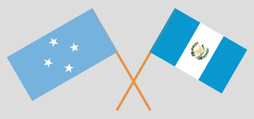 Crossed flags of Micronesia and Guatemala. Official colors. Correct proportion