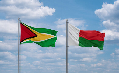 Madagascar and Guyana flags, country relationship concept