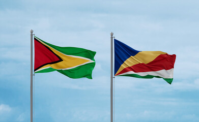 Seychelles and Guyana flags, country relationship concept