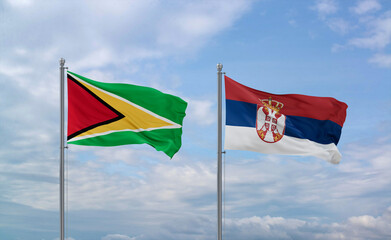 Serbia and Guyana flags, country relationship concept