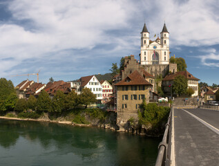 Fototapeta na wymiar River Aare and the Evangelical church in Aarburg, Canton of Aargau