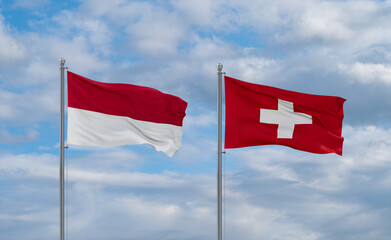 Switzerland and Indonesia and Bali flags, country relationship concept