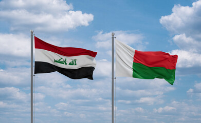 Madagascar and Iraq flags, country relationship concept