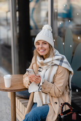 stylish woman walking in winter street