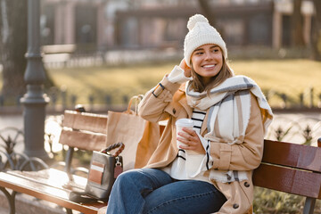 stylish woman walking in winter street