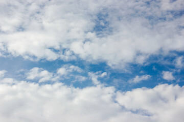 It's a classic, serene sight to see a blue sky dotted with fluffy, white layers of clouds