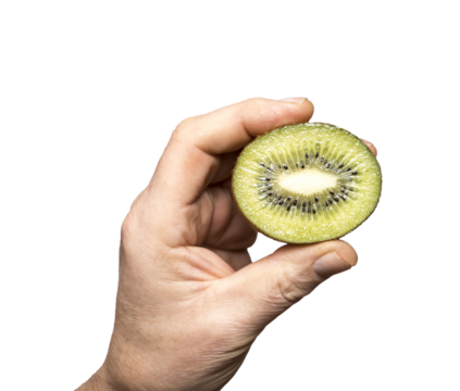 a kiwi cut in hand