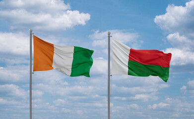Madagascar and Ivory Coast flags, country relationship concept
