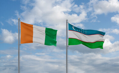 Uzbekistan and Ivory Coast flags, country relationship concept