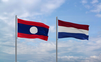 Netherlands and Laos flags, country relationship concept