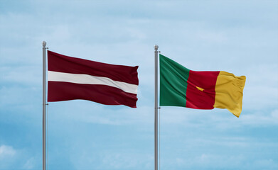 Cameroon and Latvia flags, country relationship concept