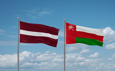 Oman and Latvia flags, country relationship concept