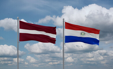Paraguay and Latvia flags, country relationship concept