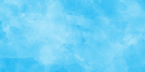 soft and lovely sky blue watercolor background with clouds, Sky clouds with brush painted blue watercolor texture, small and large clouds alternating and moving slowly on cloudy winter morning sky.