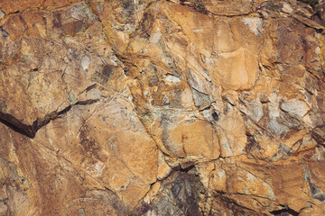 Texture cracked rock formation rock in the wild. Rocky cliff. Abstract Stone texture. Steep cliff...