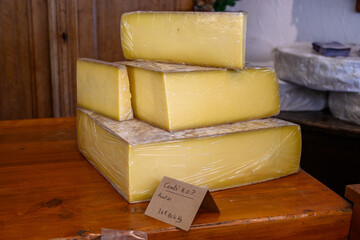 Farmer shop in La Grave ski village, Hautes Alpes, France, cheese for sale, lettering in French means Comte cheese made in August 2021, farmers cheese, close up