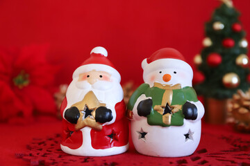 サンタクロースと雪だるま　クリスマスイメージ