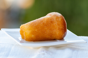 Fresh baked italian dessert homemade rum baba soft cake close up