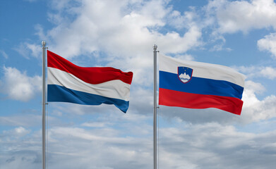 Slovenia and Luxembourg flags, country relationship concept