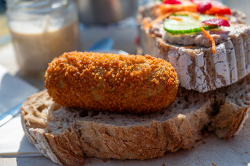 Dutch fast food, deep fried croquettes filled with ground beef meat served on bread