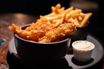 Dutch snacks for beer or wine, french fried potato chips and deep fried tempura shrimps and hot dip...