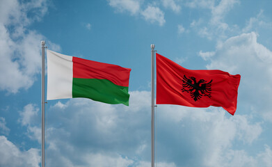 Madagascar and Albania national flags, country relationship concept