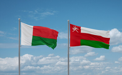 Oman and Madagascar flags, country relationship concept