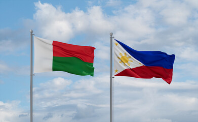 Naklejka na ściany i meble Philippines and Madagascar flags, country relationship concept