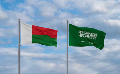 Madagascar and Saudi Arabia flags, country relationship concepts