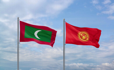 Kyrgyzstan and Maldives flags, country relationship concept