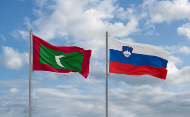 Slovenia and Maldives flags, country relationship concept