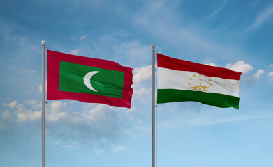 Tajikistan and Maldives flags, country relationship concept