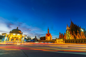 The color of Night traffic lights on the Road in Ganesh shrine in Measured and Temple (Thai language:Wat Chan West) is a Buddhist temple It is a major tourist attraction Phitsanulok, Thailand.