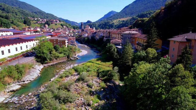 Northern Italy travel and scenic places - Charming village San Giovanni Bianco aerial drone 4k HD video. Bergamo province, Lombardy region