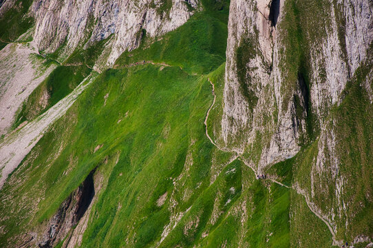 Aerial view of hikers walking along Schlafler ridge, Alpstein, Appenzell, Switzerland