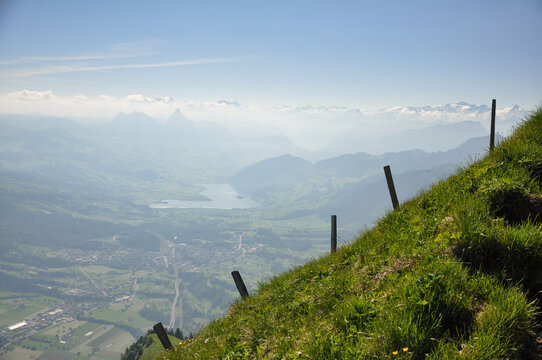 Fence posts on a mountain slope in Swiss Alps, Switzerland
