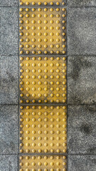 Concrete Floor texture Dot sign on the floor for warning blind people