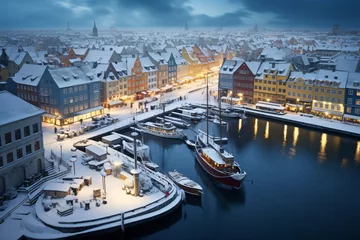 Fotobehang Aerial photography of Nyhavn, copenhagen in snowy winter, beautiful architecture, stunning view, city lights  at blue hour © 1by1step