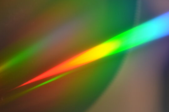 Refraction prism light rainbow holographic background effect texture. Abstract background texture for web print design. Ethereal light flare effect. Hologram reflection, crystal flare leak overlay