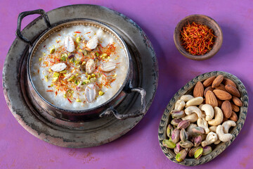 Kheer, also known as payasam, is a popular Indian pudding that is usually prepared by boiling milk, sugar or jaggery and rice.