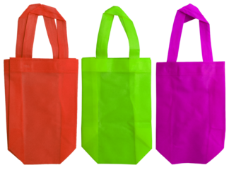 three pieces of orange, light green and purple non-woven fabric tote bag isolated. set or collection with various colors. environmentally friendly polypropylene