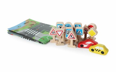 Set of wooden road signs and cars isolated on white. Children's toy