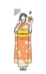 預金通帳を見て落ち込む振袖姿の女性、お正月の初詣や成人式、卒業式や結婚式などで