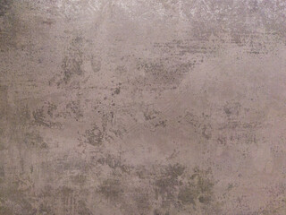 An old concrete wall with scuffs. Gray matte background.