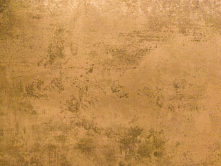 An old concrete wall with scuffs. Yellow matte background.