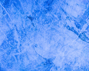 An old wall with scuffs and damage. Blue metallic background.
