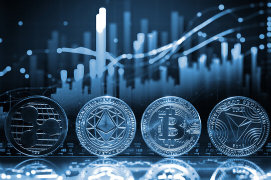 Criptomonedas y tecnolog&iacute;a.
Bitcoin,Ethereum,XRP y TRX monedas de oro sobre fondo futurista y abstracto de gr&aacute;ficos burs&aacute;tiles. Concepto de finanzas e inversi&oacute;n.