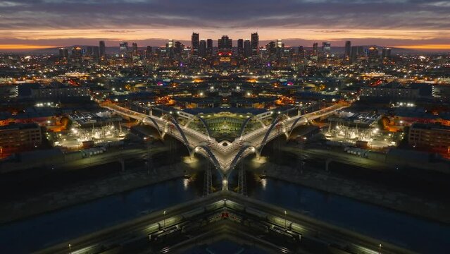 Amazing shot of evening metropolis. Mirror projection of urban borough and downtown skyscrapers in background. Los Angeles, USA. Abstract computer effect digital composed footage