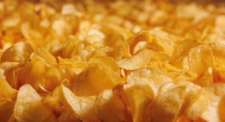 Banner Fresh Crispy potato chips snack texture background, top view